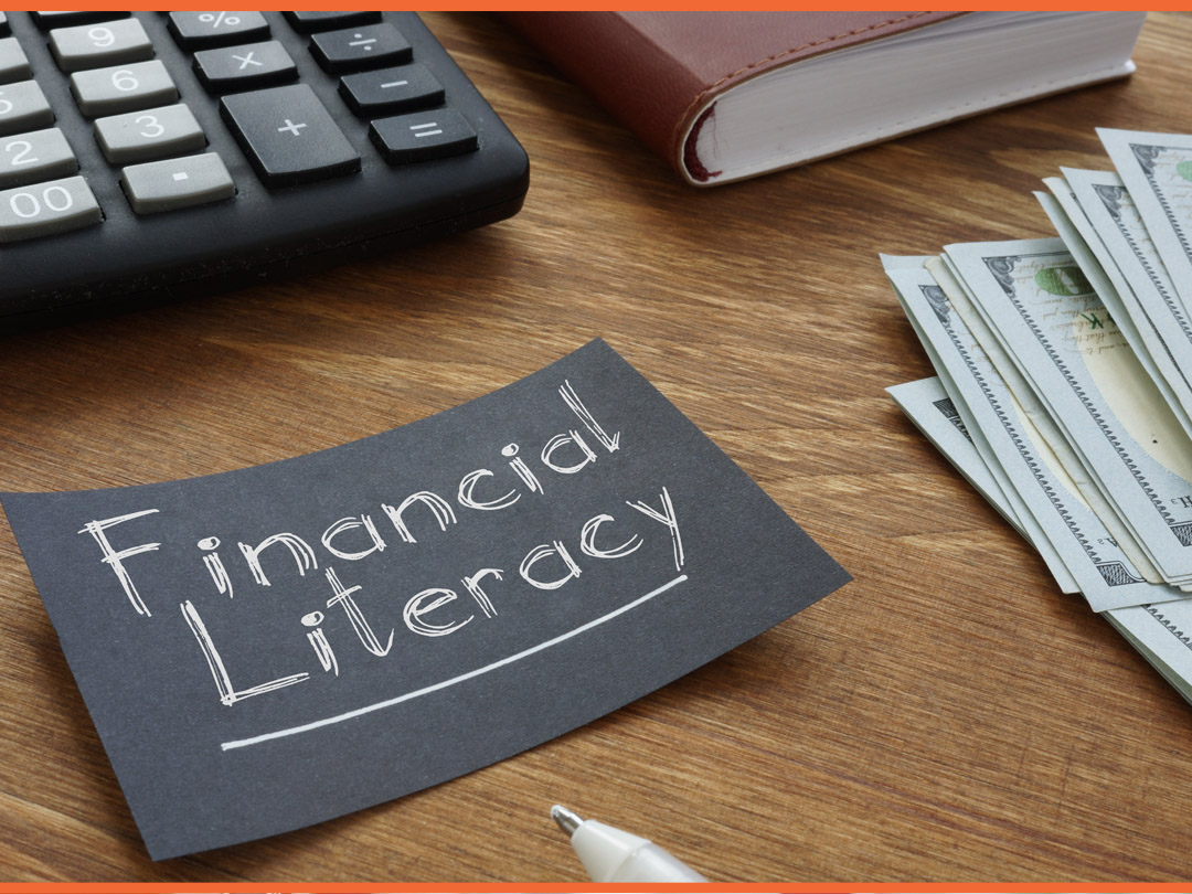 Un papel negro con letras blancas que dicen "Educación financiera".