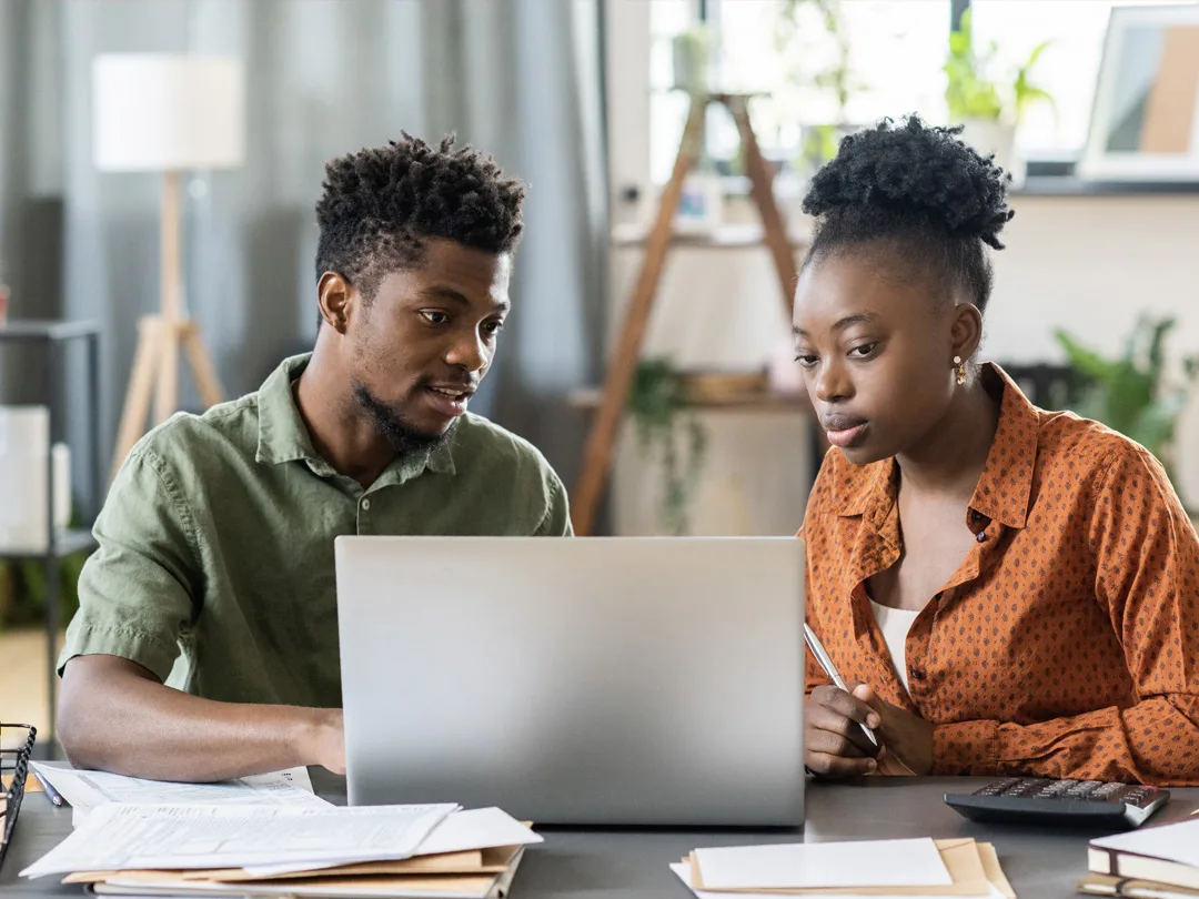 Couple reviewing their tax brackets